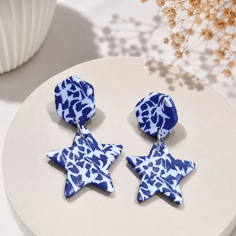 Aros Miss Clay Jaspeado azul-blanco