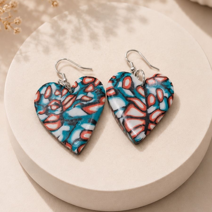 Aros Miss Clay corazón verde coral
