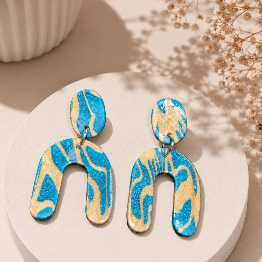 Aros Miss Clay marmoleados azul petróleo